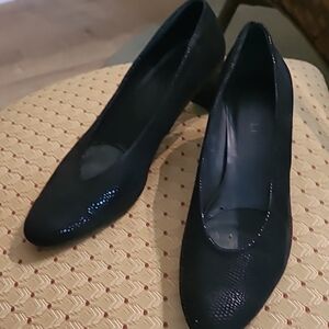 Navy Vaneli pumps with silver metal detail on heel